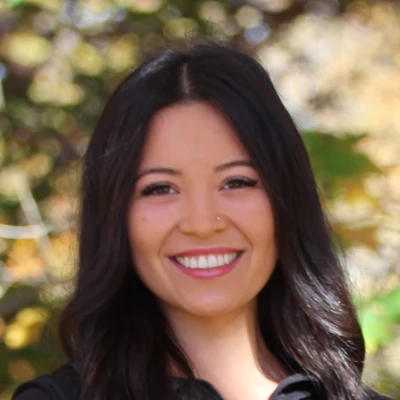 A headshot phot of Ari Jimenez